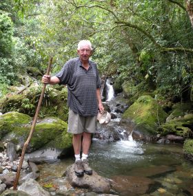 Man on a rock in a river in Boquete, Panama – Best Places In The World To Retire – International Living